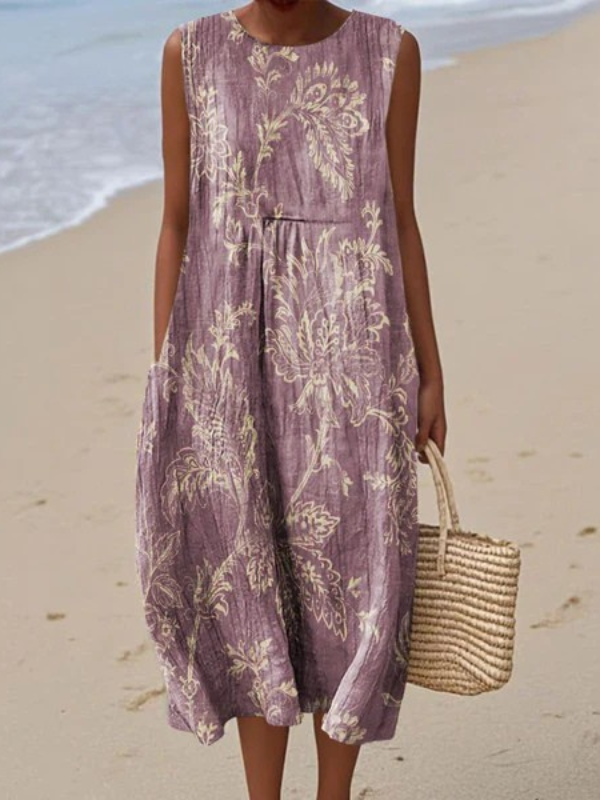 Mia | Robe midi élégante et fluide à fleurs délicates