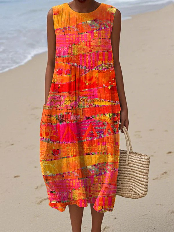 Faye | Robe mi-longue élégante et fluide aux teintes coucher de soleil